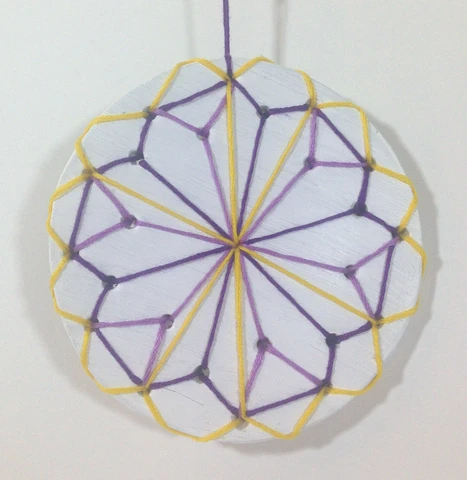 hanging white air drying clay mandala